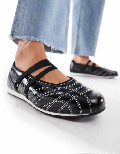Zapatillas de deporte negras estilo bailarinas con detalle de tiras Lilian de London Rebel