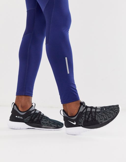 Moral Dios documental Zapatillas de deporte negras flex contact 3 de Nike Running | ASOS