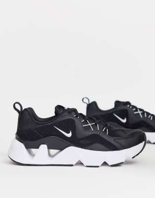 nike negras con blanco