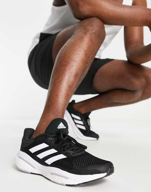 ~ lado Impresión Más grande Zapatillas de deporte negras Solar Glide 5 de adidas Running | ASOS