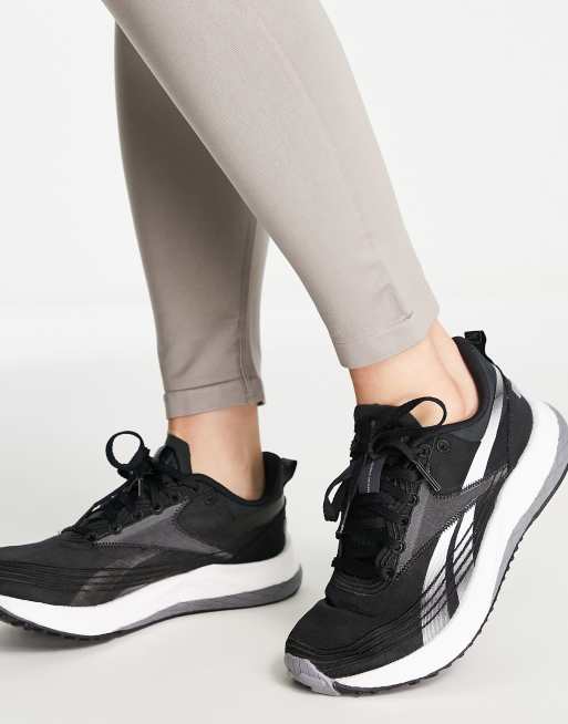 Zapatillas deporte negras y blancas Floatride Energy 4 de Reebok Running ASOS