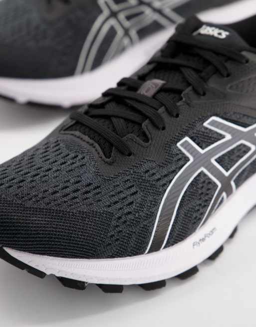 Zapatillas de deporte negras y blancas Running GT 1000 10 de Asics