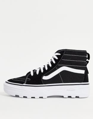 Zapatillas de deporte negras y blancas UA Sentry SK8-Hi de Vans