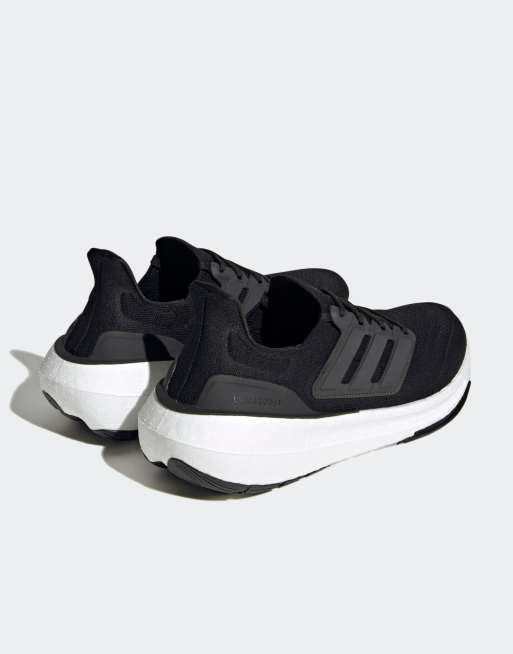 Adidas ultra boost blancas hotsell hombre negro