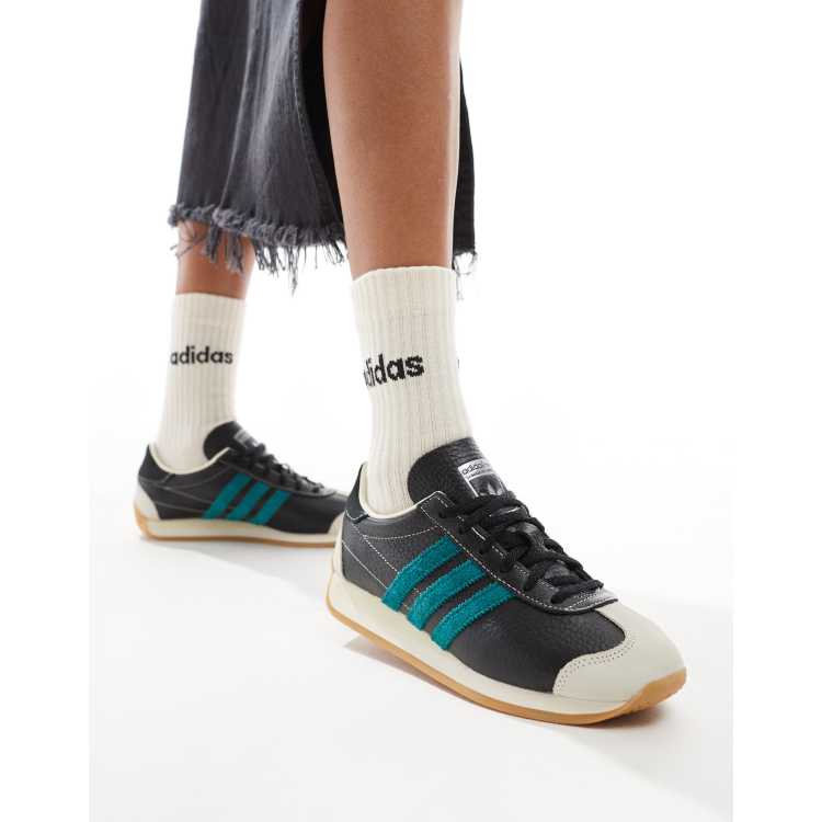 Adidas gazelle negras puestas online