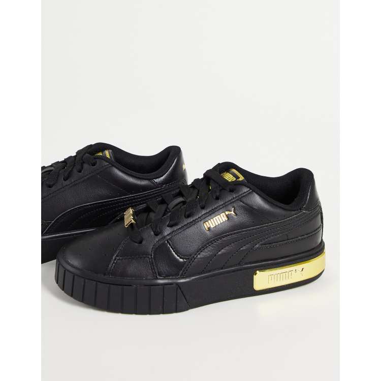 Puma negro 2025 y dorado