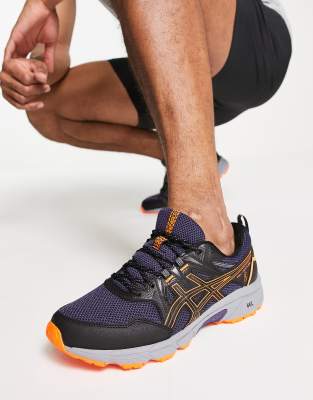 asics negras y naranjas