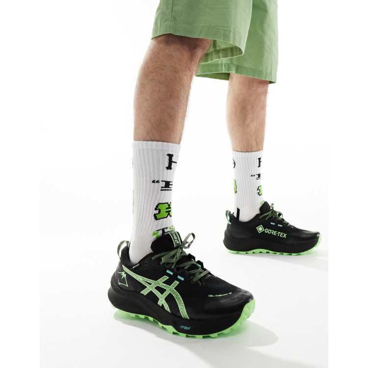 Asics negras y verdes 2025
