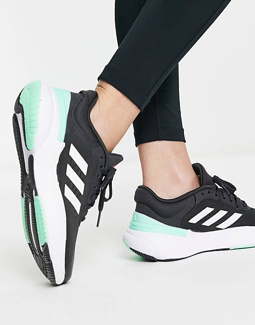 Frontera diseño Viajero Zapatillas de deporte negras y verdes Response Super 3.0 de adidas Running  | ASOS