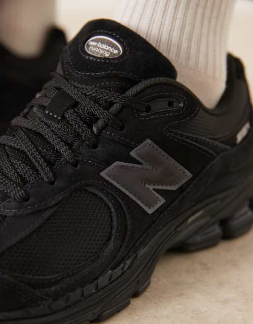 Zapatillas de deporte negro triple 2002 de New Balance, 4 de 5