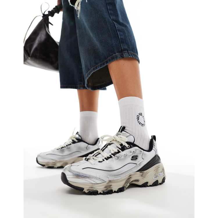 Zapatillas de deporte plateadas con detalle de cincha superpuesto y efecto desgastado D Lites de Skechers ASOS