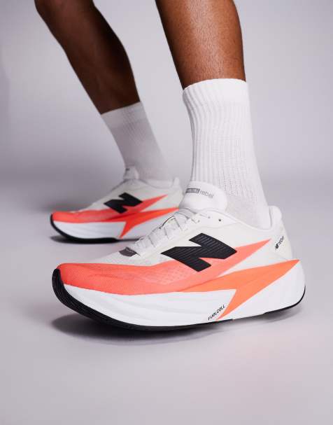 Zapatillas de deporte rojo luminoso y blancas para correr de hombre FuelCell Rebel V5 de New Balance - view 1