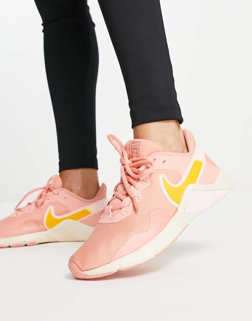 Zapatillas nike 2025 rosas y doradas