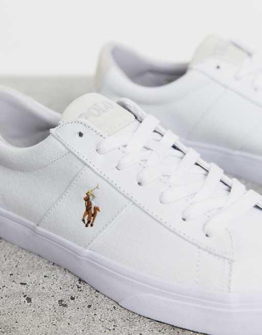 Zapatillas de lona blancas con detalle de jugador de polo