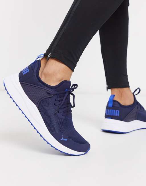 Sabroso suizo Tierra Zapatillas de rendimiento en color azul chaquetón y azul PACER NEXT CAGE de  Puma | ASOS