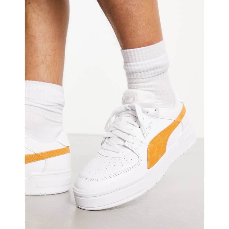 Zapatillas deportivas blancas con detalles amarillos de ante CA Pro de PUMA ASOS