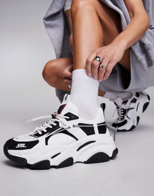 Zapatillas deportivas blancas y negras con suela gruesa Vault2 de Steve Madden