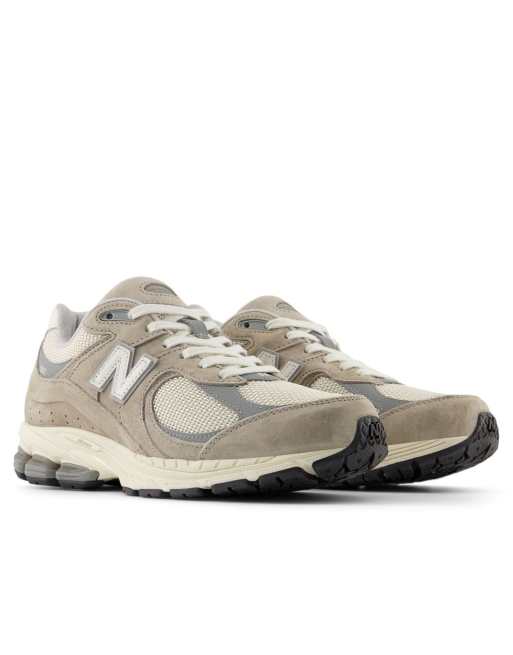 Zapatillas deportivas marrones unisex con detalles beis 2002 de New Balance , 2 de 4
