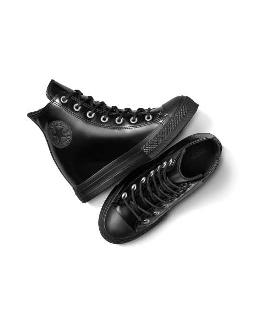 Zapatillas deportivas negras con cuna y plataforma de cuero Chuck Taylor All Star de Converse