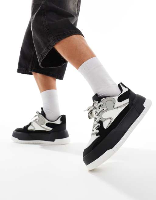 Zapatillas deportivas negras y blancas con suela gruesa de ASOS DESIGN
