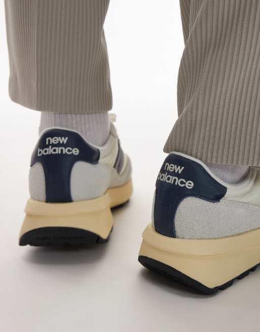 Zapatillas en blanco y azul marino 370 de New Balance, 3 de 5