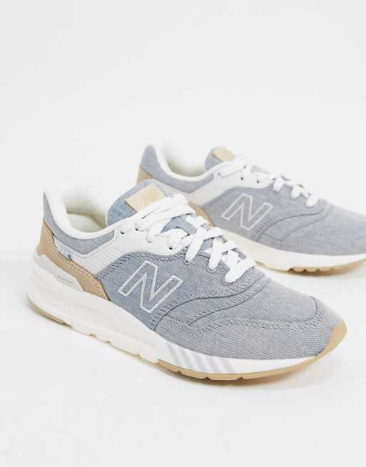New balance gris y dorado clearance