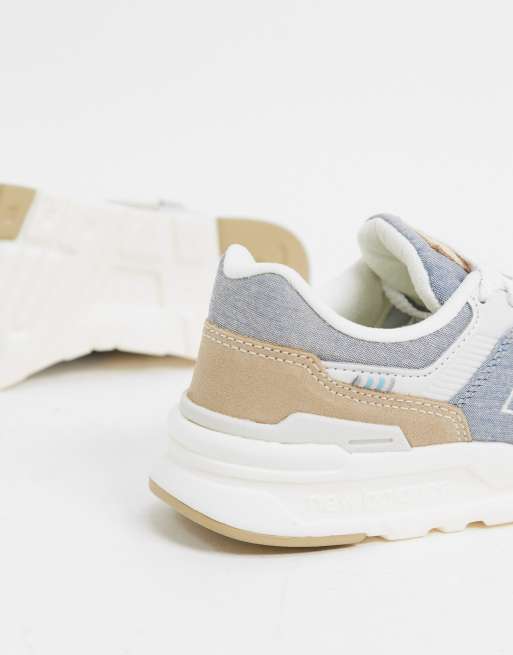 New balance gris y dorado store