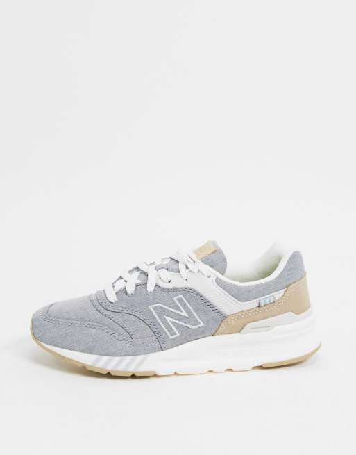 New balance gris y dorado clearance