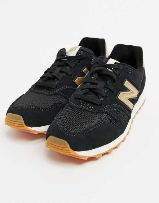 New balance negras discount y doradas