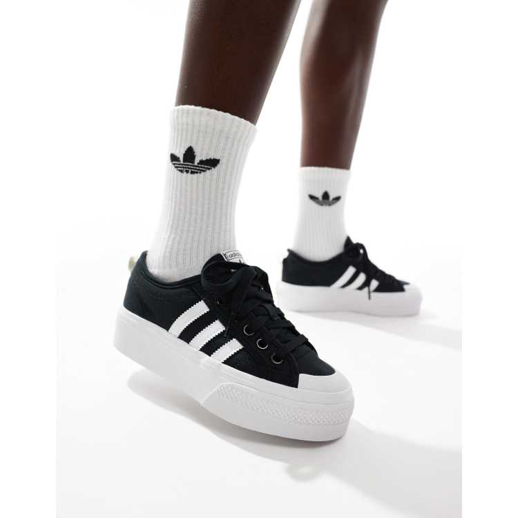 Ventana mundial Pensativo Mojado Zapatillas en negro y blanco con plataforma Nizza de adidas Originals | ASOS