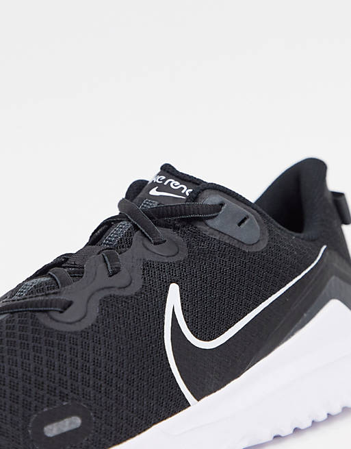Zapatillas en negro y blanco Renew Arena de Nike Running | ASOS