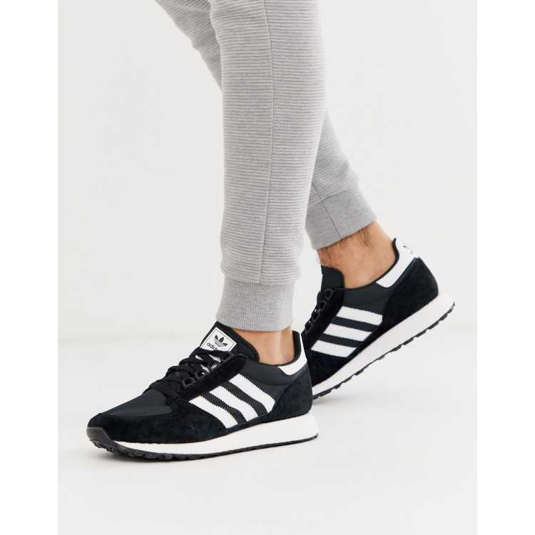 Intrusión Represalias católico Zapatillas negras Forest grove de adidas | ASOS