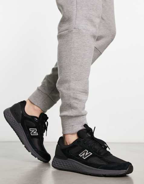 New balance negras para cheap hombre