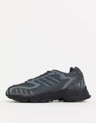 Adidas torsion outlet negras y doradas