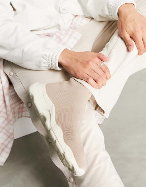Zapatillas rosas de estilo calcetín de punto de ASOS DESIGN