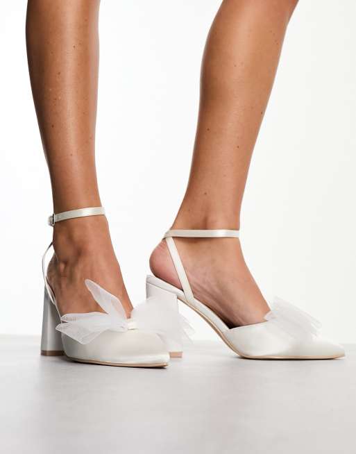 Zapatos de novia color marfil de tac n de bloque con lazos de tul