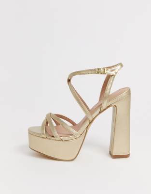 zapatos de tacon dorados