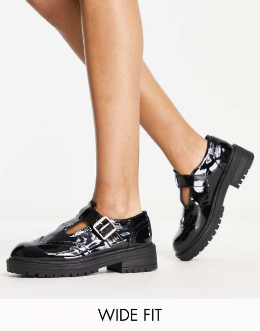 Zapatos negros con diseño de T y suela gruesa de charol Luca de schuh Wide Fit
