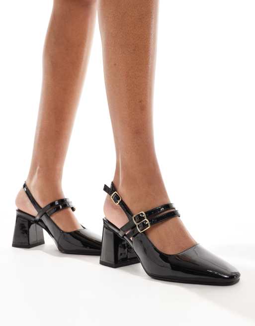 Zapatos negros destalonados de tacón grueso de altura media Talia de London Rebel