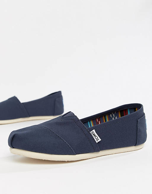 Zapatos planos clásicos de lona de color azul marino de TOMS