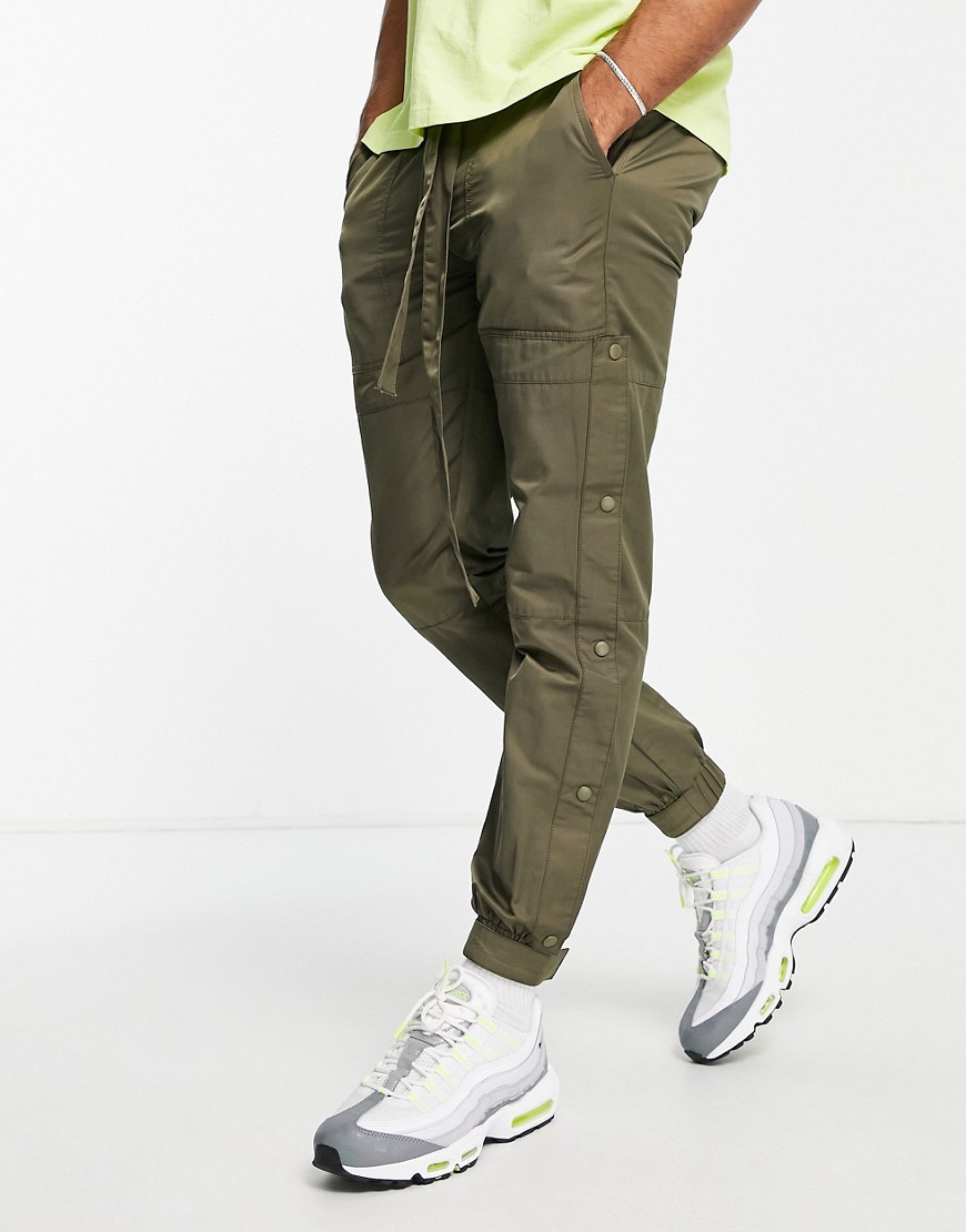 фото Зауженные брюки цвета хаки со вставками, поясом и кнопками topman-зеленый цвет