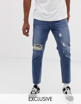 фото Зауженные джинсы с рваными коленями collusion x003-синий
