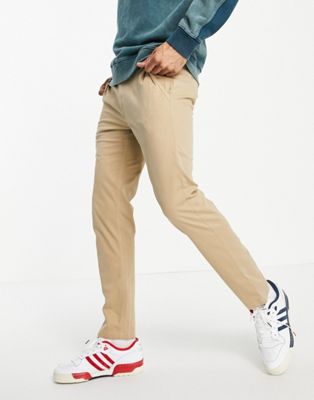 фото Зауженные эластичные чиносы выбеленного цвета calvin klein jeans 016-светло-бежевый