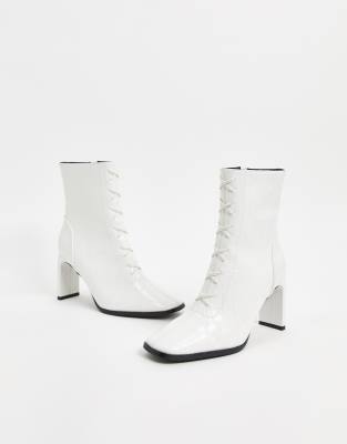 white heeled ankle boots