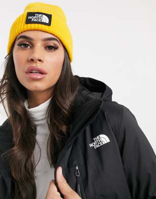 yellow north face cap