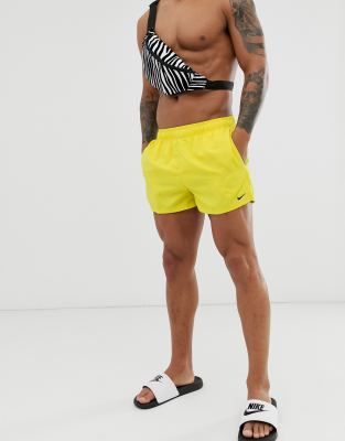 yellow nike swim trunks
