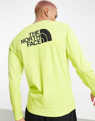 фото Желтый лонгслив the north face easy