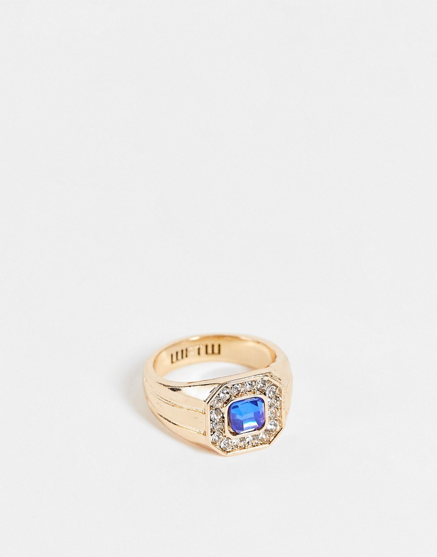 фото Золотистое кольцо-печатка с камнем синего цвета wftw-золотистый