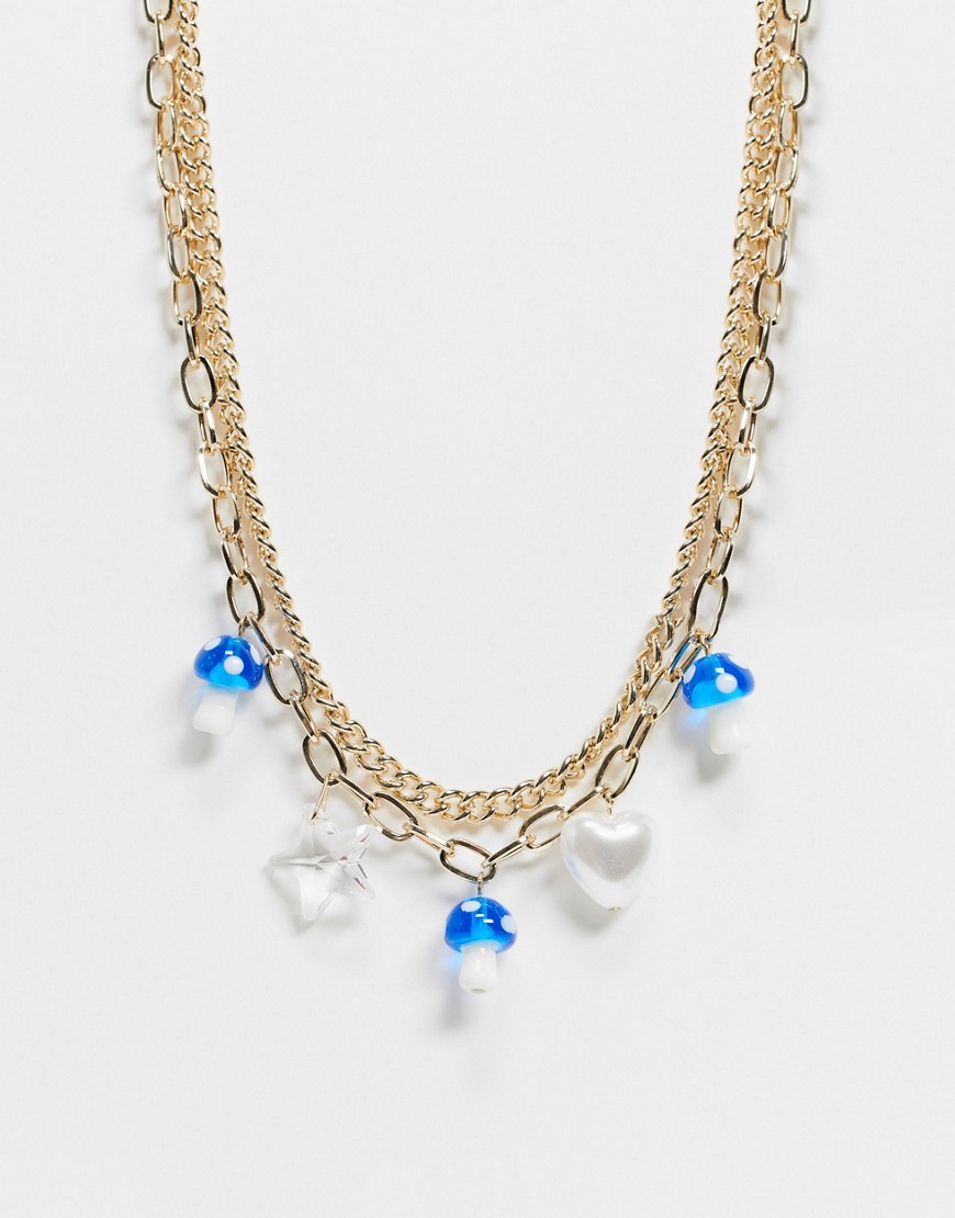 фото Золотистое ожерелье в несколько рядов с синими подвесками в виде грибов topshop-золотистый