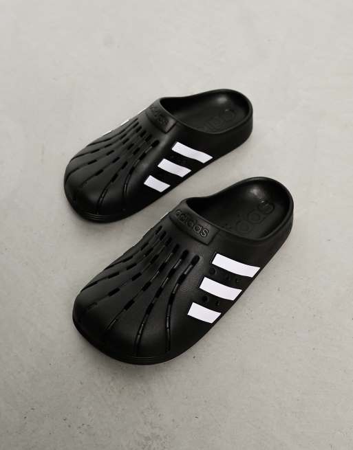 vaso Desempleados ley Zuecos negros Adilette de adidas Originals | ASOS